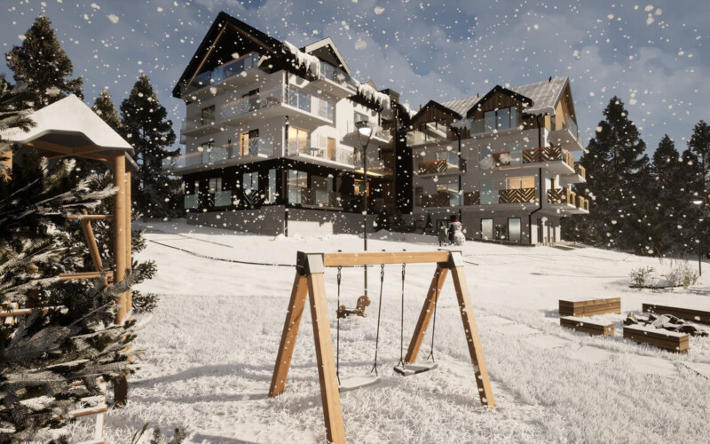 apartamentowiec w Szklarskiej Porębie zimą, wraz z zaśnieżonym terenem i strefą dla dzieci.